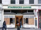 A boarded up Starbucks in Piccadilly, London, 18 January 2009. The windows were smashed by protesters following a Stop the War Coalition rally in Trafalgar Square.