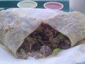 English: A carne asada burrito from El Patron Restaurant in Poway, California. This type of carne asada meat can be found throughout San Diego and the surrounding areas.