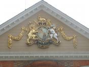 A picture of the Royal coat of arms of the United Kingdom of the Hanoverian period (1714 – 1801) on the Governor's Palace in Williamsburg, Virginia at Colonial Williamsburg.