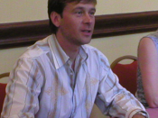 Connor Trinneer, an American actor widely known for playing Charles Tucker III in Star Trek: Enterprise sits signing autographs at a convention on July 10 2006.