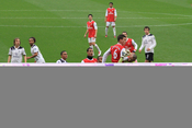 English: Laurent Koscielny (6) of Arsenal F.C. clashes with Heurelho Gomes of Tottenham Hotspur F.C. in November 2010.