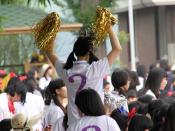 English: Students cheer their team on Sports Day