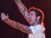 English: Vocalist, Jerry Roush performing as a part of Of Mice & Men in 2010 in Tempe, Arizona on Attack Attack!'s This Is a Family Tour.