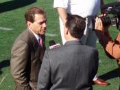 English: A television reporter interviews University of Alabama head football coach Nick Saban.