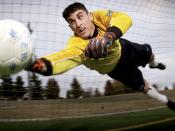 MCCHORD AIR FORCE BASE, Washington: 1st Lt. Richard Cullen, a communications officer, plays goal keeper with the Seattle Sounders, a Colorado Springs Premier Development Soccer League team. Cullen's assignment keeps him hopping at both the wing headquarte