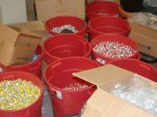 Several large buckets of anabolic steroid vials confiscated during a DEA raid