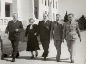 English: Sir Robert Menzies, Dame Enid Lyons, Eric Harrison, Harold Holt and an Airforceman outside Old Parliament House Canberra.