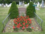English: Burial site and gravestone of Lucy Maud Montgomery, famous author Anne of Green Gables, PEI Canada.