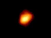 This image by the Hubble Space Telescope displays an asymmetrical shape of the red giant star Mira. This may be due to expansion-contraction cycles, or else unresolved surface features.