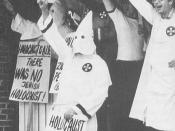 KKK members displaying the Nazi salute and advocating Holocaust denial.