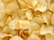 English: A pile of potato chips. These are Utz-brand, grandma's kettle-cooked style.