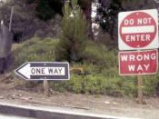 Standard wrong-way sign package used on all freeway off-ramps in California. This does not comply with the US Manual on Uniform Traffic Control Devices MUTCD Section 2A.18. Mounting Height. #section2A18 .