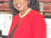English: Circuit Court Clerk Dorothy Brown stands near court case files