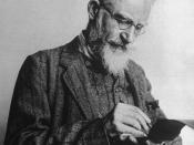 English: Anglo-Irish playwright George Bernard Shaw writing in notebook at time of first production of his play 