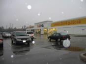 No Frills store in Etobicoke, Ontario, in the rain.