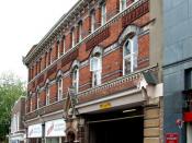 English: The former Lincoln Equitable Cooperative Industrial Society, Lincoln The Co-op building, of 1889, sits opposite the Central Library. The terracotta detailing reads, 'The Lincoln Equitable Cooperative Industrial Society'. The traditional beehive e