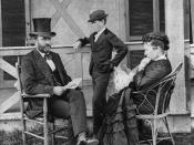 English: Ulysses S. Grant seated on porch with his wife, Julia, and son, Jesse.