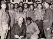 The Scottsboro Boys, with attorney Samuel Leibowitz, under guard by the state militia, 1932