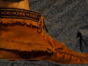 A soft-soled moccasin.