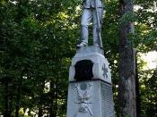 This is a photo of the Iron Brigade Monument in the Gettysburg National Military Park which is located in the vicinity where the Brigade first became engaged with the Confederate Army on the first day of the Battle of Gettysburg. Photo by Robert Swanson