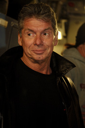 Vince McMahon, the Chairman of the Board of the World Wrestling Entertainment, Inc. boards a C-17 Globemaster III at Charleston Air Force Base, S.C. The 437th Aerial Port Squadron hosts the WWE stars and crew before a flight to Ramstein Air Base, Germany,