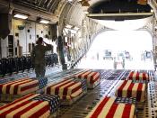 FORT HOOD, Texas- The remains of the Nov. 5 massacre victims at Fort Hood are loaded aboard an aircraft before being flown to Dover Air Force Base, Del. Twelve Soldiers and one civilian were killed Nov. 6 at the post's Soldier Readiness Processing Center.