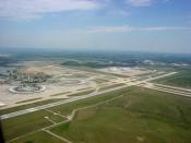 English: Kansas City International Airport (IATA: MCI).