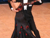 English: Victor Fung and Anna Mikhed dancing a ballroom tango. The couple, dancing for the USA, came third in the World Professional Standard Championship 2009. Photo taken in 2006 by Porfirio Landeros, Kwixite Media, in San Diego, California.