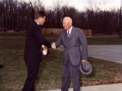 English: President Kennedy and President Eisenhower meet at Camp David, Maryland, April 1961