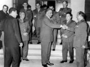 English: Egyptian President Gamal Abdel Nasser meeting Syrian delegation pushing for unity between Egypt and Syria. Nasser is shaking hands with Afif Bizri. To the left is Abdel Hakim Amer and next to him is Amin al-Hafiz
