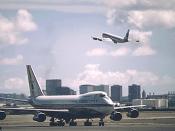 United Airlines Boeing 747 at Honolulu International Airport. A Pan American World Airways Boeing 707 is taking off in the background. EPA photo accessed through National Archives. Reprocessed from :Image:UA747 HNL 1973.gif for better colour by Adrian Pin