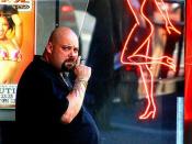 A bouncer in front of a strip club in San Francisco.