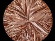 Continuous casting copper disc (99.95% pure), macro etched, ∅ ≈83 mm.