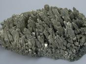 English: A chunk of vapor-deposited magnesium crystals produced by the Pidgeon process at a refinery in China. Its maximum dimension is about 24 cm long.