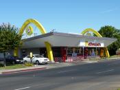 English: Historic McDonald's location: In July 1955, Ray Kroc (who had begun taking over the chain from the original McDonald's brothers) opened his own first sub-franchisee in Fresno at this location. The original structure was demolished for a contempor