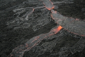 Pāhoehoe Lava flow at The Big Island of Hawai. The picture shows few overflows of a main lava channel. The picture was taken from a helicopter.