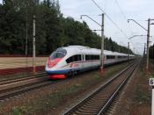 English: Russian Sapsan (Russian: Сапсан) high speed train (#155) passing Malino train station in Zelenograd, Moscow. This is the first high-speed train in Russia. The train is the same as ICE, but it goes slower than German ones; on this spot the speed w