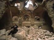 A cello player in the partially destroyed National Library, Sarajevo, during the war in 1992.