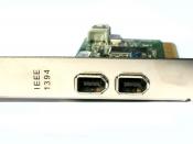 English: A photo of a IEEE 1394 (also known as Firewire) PCI Expansion Card and connection slots.