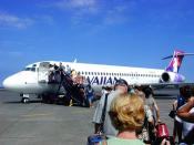 English: Loading Hawaiian Airlines Boeing 717-200 on July 2, 2004 at Kona International Airport; photograph contributed by Eric Guinther.
