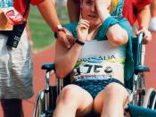 English: Australian athlete Marsha Green is assisted from the track at the 1996 Atlanta Paralympic Games