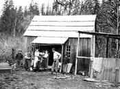 A Tulalip family in front of their home on the reservation in 1916