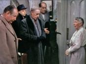 Mrs. Wilberforce (Katie Johnson) lectures the gangsters (from left to right: Cecil Parker as Claude (
