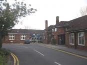 English: Westbury Hospital. The main entrance to Westbury Hospital. This valuable community resource is currently under threat of closure due to budget deficit issues at the local Primary Care Trust.
