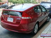 English: Rear view of the Honda Insight Hybrid, Virginia plates, at Washington, DC
