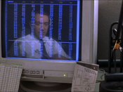 Lester's reflection in the monitor is intended to resemble a man in a jail cell, evoking the director's intended theme of imprisonment and escape from imprisonment.