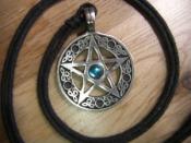 English: Photograph of a pentacle upon which is depicted a pentagram, the sacred symbol within the religion of Wicca.