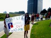 English: Members of United Students Against Sweatshops march outside the offices of Russell Corporation in Atlanta, GA, during a protest against Russell's worker rights violations at its Honduras factories.