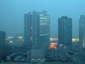 Beijing, in the thick of a hot, gritty sand storm, brought about because of desertification of the land to the north-west.