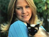 Susan Ford, daughter of US President Gerald Ford, with Shan, the Ford family's Siamese cat.